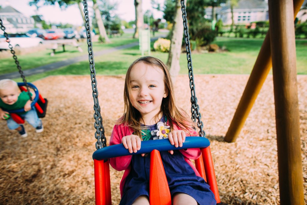 Toddler on Swing at Ribby Hall Village